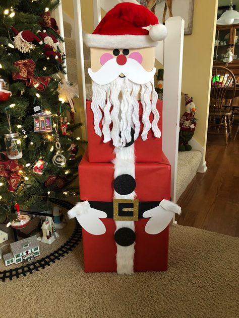 Santa Wrapped Presents, Santa Decorations Christmas, Santa Gift Box Ideas, Santa Presents Wrapping, Santa Box Ideas, Christmas Gift Tower Ideas, Snowman Boxes Christmas, Santa Wrapping Ideas For Kids, Santa Decorations Diy Ideas