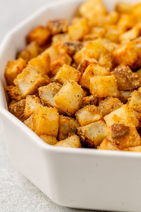 Learn how to make these crispy fiesta potatoes that are just like the ones from Taco Bell (but better). Super crispy with a hint of spice, these potatoes are perfect on tacos, in bowls, and salads too. #vegan #tacobell #copycat #recipe #potatoes #sweetsimplevegan #crispy Taco Bell Fiesta Potatoes, Taco Bell Potatoes, Fiesta Potatoes, Nacho Sauce, Taco Bell Recipes, Potato Tacos, Seasoned Potatoes, Recipe Sweet, Crispy Potatoes