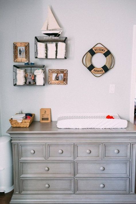 I like the wire baskets as shelves. We might make some out of lobster trap wire. Painted Nursery Furniture, Nautical Nursery Boy, Boy Room Paint, Concord California, Gray Dresser, Gray Furniture, Baby Boy Decorations, Grey Baby Nursery, Grey Dresser