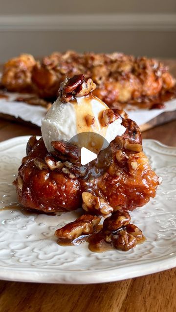 Kiley O'Donnell on Instagram: "STICKY PECAN CARAMEL MONKEY BREAD  Soft, gooey & warming goodness ✨ Recipe below OR comment ‘CARAMEL’ to get the recipe sent to you 🤎  #Recipe Details (8-10 servings): Monkey Bread Dough: - 2 1/2 cups all-purpose flour - 3 tsp baking powder - 1/4 tsp baking soda - 1/2 tsp salt - 2 cups greek yogurt (it HAS to be greek yogurt for these measurements) Cinnamon Sugar Coating: - 1/2 cup granulated sugar - 3 tbsp cinnamon Pecan Caramel Topping: - 1 cup chopped pecans - 1/2 cup salted butter, melted - 1 cup brown sugar  - 1/2 cup maple syrup - Vanilla ice cream, for serving   Instructions: Preheat the oven to 375F. Grease a 9x13” or 9” square/round baking dish with avocado oil cooking spray or butter. Sprinkle the chopped pecans evenly along the bottom of the pan. Yogurt Dough, Caramel Monkey Bread, Almond Filling, Bread Soft, Cinnamon Pecans, Holiday Sweets, Almond Croissant, Dairy Free Yogurt, Cold Desserts