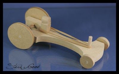 Enjoy building this rubber band racer for your child or grand child. Make sure to take the age into consideration with this toy. If broken ... Rubber Band Car, Scrollsaw Workshop, Natural Wood Toys, Wooden Toy Cars, Wood Toys Plans, Scroll Saw Patterns Free, Scroll Saw Pattern, Diy Wooden Projects, Bear Shop