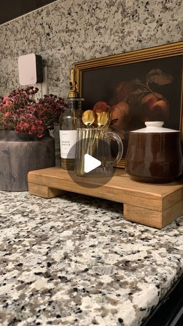 Madelaine on Instagram: "Thank you so much @luxebco for sending this beautiful wooden riser! 🤎 it’s so versatile and can easily be styled anywhere in your home. I decided to make a little coffee corner on my kitchen counter because 2 coffee bars are better than 1! 🙌🏻  Comment SHOP or go to my link in bio to shop my VIBE✨  Follow for more home inspo! 🫶🏼  #luxebco #woodenriser #kitchencounterdecor #kitchenideas #kitcheninspo #stylewithme #stylingtips #coffeecorner #coffeebar #coffeestation #moodyinteriors #cozyhome" Coffee Corner Countertop, Coffee Station On Counter, Coffee Bar Countertop Ideas, Wooden Riser, Coffee Bar Design, Moody Interiors, Coffee Bars, Kitchen Counter Decor, Coffee Corner