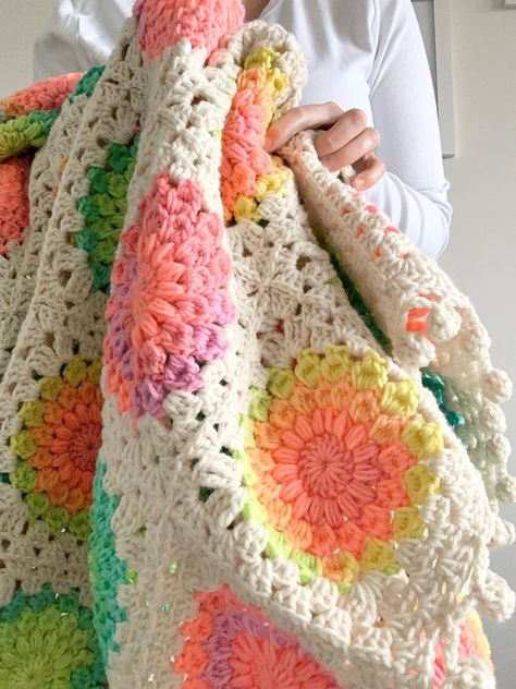 How to Crochet: Retro Stripe Sunburst Granny Square Throw — NautiKrall Crochet How To Add A Border To A Granny Square, Spin Your Granny Square Blanket, Granny Square Sunburst Pattern, Neon Granny Square Crochet, Tie Dye Crochet Blanket, Sunburst Crochet Granny Square, Tangled Granny Square, Sunburst Granny Square Pattern Free, Granny Square Crochet Pattern Blanket