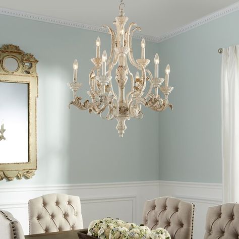 More than just illumination for your entryway or dining room, this eye-catching chandelier adds heirloom-inspired appeal to your abode. Crafted from metal, its frame features a turned silhouette accented by scrolling arms and carved details. Its nine lights are what really make this piece shine, sitting among two tiers and offering an exposed candelabra design for a warm glow. This fixture measures 34'' H x 28'' W x 28'' D. Chandelier Dining Room, Quorum Lighting, Tiered Chandelier, Tier Chandelier, Dining Room Light Fixtures, White Chandelier, Candle Style Chandelier, Geometric Chandelier, Candle Chandelier