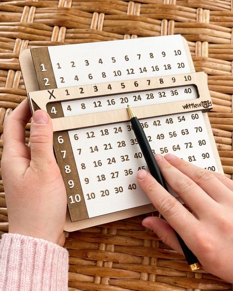 "The wooden multiplication chart is the ideal educational teaching material for preschool, primary school, kindergarten and more. Its portable size provides convenience in outdoor, classroom and home use. Quality and Safe Material: Multiplication table was made by natural wood, eco-friendly, as well as light weight and durable. High-quality plywood, the surface is smooth without burr, which will not hurt children's hands. Cleaning the product should be done with a damp cloth without using abrasi Multiplication Table Games, Maths Tables Project Ideas, Multiplication Times Tables, Homeschool Supplies, Multiplication Chart, Montessori Educational Toys, Multiplication Table, Laser Cut Wood Crafts, School Kindergarten