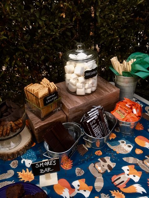 S'mores Bar for Woodland Themed Baby Shower! S’more Display, S’mores Themed Gender Reveal, S’mores Gender Reveal, S’more Baby Shower Decorations, Smores Baby Shower Theme, S’more Love Baby Shower Ideas, Bonfire Baby Shower Ideas, Smores Gender Reveal, S’mores Baby Shower Theme