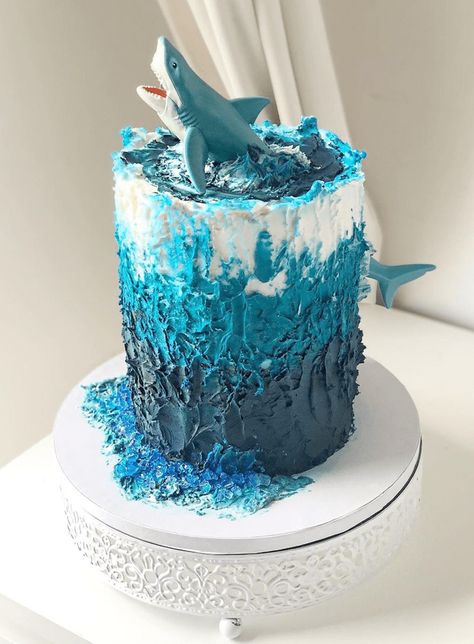 Shark Cake Design Images (Shark Birthday Cake Ideas) Shark Themed Cakes, Sea Birthday Cake, Shark Birthday Cake, Ocean Birthday Cakes, Shark Cupcakes, Shark Birthday Cakes, Ocean Cakes, 10 Birthday Cake, Birthday Cake Decorating Ideas