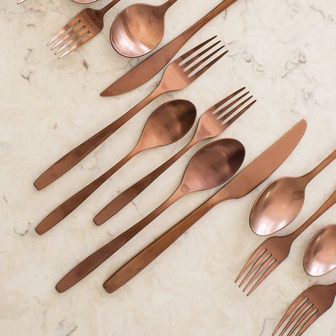 20-piece forged service for 4 with balanced, gently curving handle and brushed copper color finish. Material: 18/0 Stainless Steel Imported 10-Year limited warranty Dishwasher Safe. Avoid using abrasive cleaning agents such as steel wool and citric acid detergent. Do not soak, clean after use. Includes 4 each: salad/dessert forks, dinner forks, dinner knives, dinner/soup spoons, and teaspoons. Copper Silverware, Copper Cutlery, Wedding Silverware, Wedding Flatware, Banquette Ideas, Copper Flatware, Copper And Marble, Copper Utensils, Spoon Knife