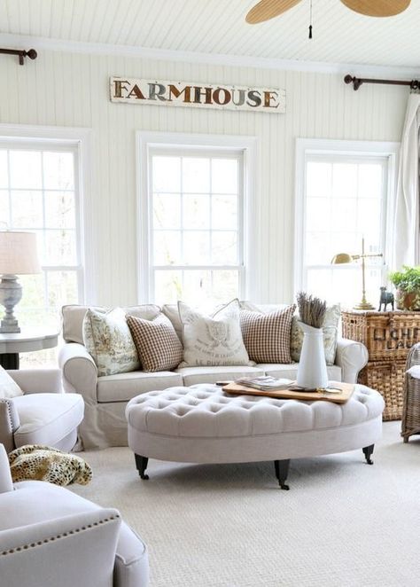 Farmhouse Ottoman in the Living Room via Savvy Southern Style. This beige tufted ottoman looks great in this farmhouse style living room! Living Room Ottoman Decor, Tufted Coffee Table, Farmhouse Ottoman, Oval Ottoman, Gray Shades, Sunroom Ideas, Farmhouse Style Living Room, Ottoman Decor, Savvy Southern Style