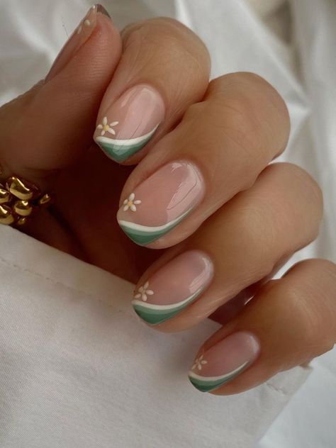 sage green side tips with a simple flower Nude Nails With Green Flowers, Nail Tip Designs Square, Fun Green Nail Designs, Biab French Tips, Spring Nails 2024 French Tip, French Biab Nail Designs, Subtle Green Nails, Sage Green Nails With Flowers, French Nail Designs Spring