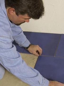 Bathroom tile installation requires careful planning. Duplex Remodel, How To Lay Tile, Toilet Tiles, Plywood Floor, Peel And Stick Floor, Plywood Flooring, Linoleum Flooring, Peel And Stick Vinyl, Peel And Stick Tile