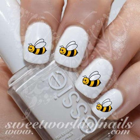 Bee Nail Art Honey Bee Nail Water Decals Wraps 20 water decals in different sizes to fit all your nails! Use: 1-Trim,clean then paint your nails with the color you want. 2- cut out the pattern and plunge it into water for 10 - 20 seconds. (use warm water in winter). 3- moisten the fingernails,stick the pattern in the p Giraffe Nails, Bumble Bee Nails, Bee Nails, Nail Water Decals, Water Nails, Animal Nail Art, Finger Nail Art, Best Nail Art Designs, Simple Nail Art Designs