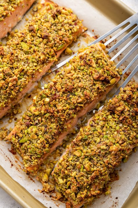 A nutty herb-infused crust and honey Dijon glaze take everyday salmon fillets to the next level in this easy pistachio crusted salmon recipe! Salmon With Pistachio Crust, Grapefruit Salmon, Salmon Sticks, Recipes Comfort Foods, Vegan Mashed Cauliflower, High Calorie Smoothies, Crusted Salmon Recipes, Dijon Salmon, Herb Crusted Salmon