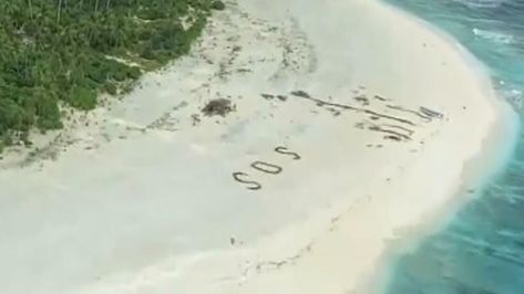 'SOS' message in sand saves three men stranded on deserted Pacific island | World News | Sky News Desert Island Aesthetic, Stuck On A Deserted Island Aesthetic, Island Survival Aesthetic, Stranded On An Island Aesthetic, Deserted Island Aesthetic, Stranded On Island, Stranded Island, Stranded On An Island, Airplane Crash