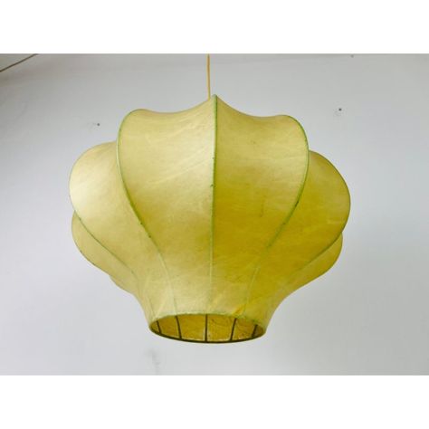 A cocoon pendant lamp made in Italy in the 1960s. The hanging lamp has been manufactured in the design of the lamps made by Achille Castiglioni. The lamp shade is of original cocoon and has an flower shape.   Measures:  Height: 36-72 cm Diameter: 42 cm  The light requires one E27 light bulb. Works with both 120/220V. Very good vintage condition.  Free worldwide express shipping.Continue Reading Mediterranean Lighting, Hallway Pendant Lighting, 1960s Italy, How To Make A Chandelier, Retro Chandelier, Large Hallway, Achille Castiglioni, Under The Tuscan Sun, Lighting Concepts