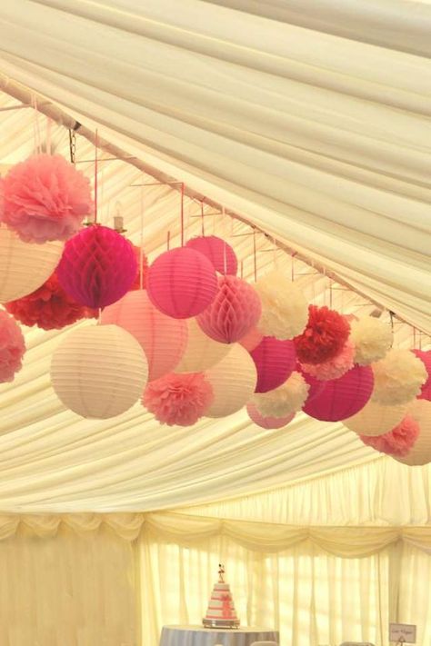 Multiple pink shades - paper lanterns, pom poms and honeycomb balls for a marquee wedding / http://www.himisspuff.com/100-charming-paper-lantern-wedding-ideas/4/ Affordable Wedding Decorations, Marquee Decoration, Paper Lanterns Wedding, Tent Decorations, Wedding Lanterns, Marquee Wedding, Pink Paper, Affordable Wedding, The Ceiling