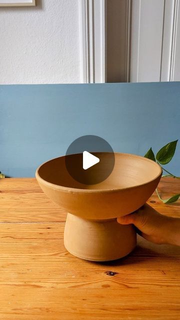 Ceramicsmadebyj on Instagram: "Like all pottery projects, the construction of this pedestal bowl happened over multiple days. Here I am trimming and binding two pieces together that I threw the day before. It's important to work with clay when it is still moist to give the two binding parts a better chance at moulding together, and reducing the risk of cracks appearing. For those playing at home, I used around 2kg of clay for the bowl and 500grams for the base. After this piece has dried out completely, I will be able to work on it again, by adding glaze and firing it in the kiln. Are you curious to see how it turned out?" Pottery Projects, Pedestal Bowl, Pottery Bowl, Pottery Pieces, Kiln, Two Pieces, The Two, Work On, Binding