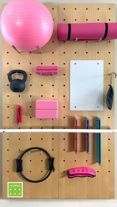 Storing yoga and gym equipment, especially in living spaces, can be problematic which is why mywall pro has come up with a solution for an easy yoga wall storage or gym wall storage using a pegboard wall to safely and easily store your yoga equipment or gym equipment on a gym equipment storage wall. Optimize your space with a peg wall storage solution and this vertical storage space solution with all our home yoga storage ideas. Home Gym Wall Storage, Gym Wall Storage, Yoga Storage Ideas, Gym Equipment Storage, Home Gym Wall, Yoga Storage, Pegboard Wall, Peg Wall, Gym Wall