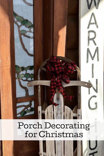 Embrace the beauty of winter with a vintage sled as the centerpiece of your front porch decor! 🎿✨ Cozy accents and seasonal touches create a warm welcome for all. #WinterDecor #FrontPorchStyle Decorating A Sled For Christmas, Christmas Sled Decoration Front Porches, Simple Christmas Porch Decor, Porch Decor For Christmas, Front Porch Winter Decor, Simple Christmas Porch, Christmas Sled Decoration, Sled Decor, Cabin Porch