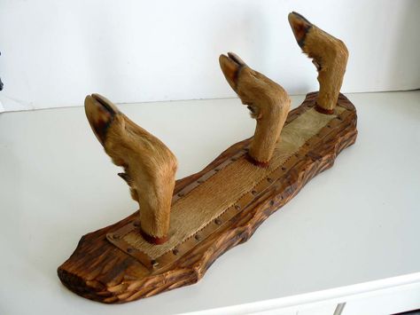 deer hoof hangers - Google Search Deer Hooves Decor, Hunting Decorations, Deer Antler Hat Rack, Deer Hooves, Deer Antler Coat Rack, Coat Hanger With Deer Antlers, Deer Hoof, Antler Ideas, Deer Camp