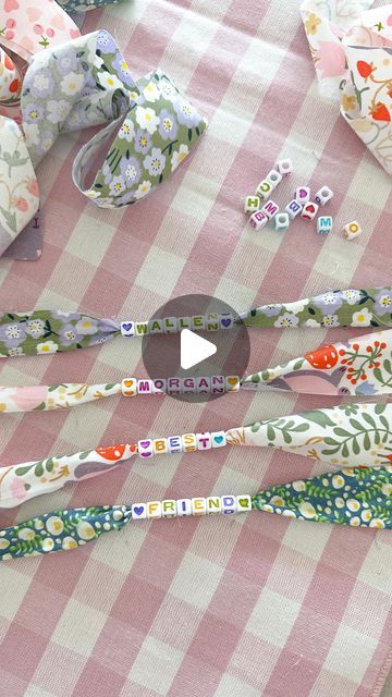 Aurelie Erikson on Instagram: "DIY fabric bracelets, aka concert bracelets 🎀   It’s officially concert season, so grab your girlfriends because girls' night just got a whole lot more fun! Everyone will LOVE making these bracelets! 🌼🌸  Tip *cut fabric strips in half down the center   everything I used is 🔗 in my Amazon store front in bio!  save & share with a friend 🫶🏼 . . . . . . . #summercrafts #diybracelet #friendshipgoals #craftylife #craftygirl #girlsnight #summercrafts #diycrafts #tutorial #morganwallen #concertseason" Fabric Scrap Bracelet, Diy Fabric Bracelets Tutorials, Fabric Beaded Bracelets, Fabric And Bead Bracelets, Fabric Friendship Bracelets Diy, Diy Fabric Bracelets, Fabric Friendship Bracelets, Concert Bracelet Ideas, Cute Bracelet Ideas Diy