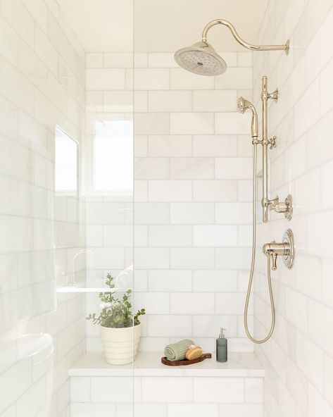 ✨ This Shower Shines ✨  Draw inspiration from the timeless charm of subway tiles for your next bathroom renovation.  📸 lygiaharkins_interiors   🚰 Cassidy® in Polished Nickel  #showerinspo #bathroomdesign #modernbathroom Casablanca Carrara Marble, Stacked Marble Shower Tile, Marble Wall Tile Bathroom, 6x12 Shower Wall Tile, Carrara Marble Shower Ideas, Honed Carrara Marble Bathroom, Primary Shower Tile, Marble Subway Tile Shower Walls, Traditional Marble Bathroom