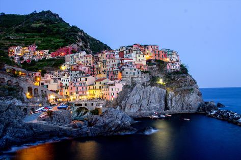 Italy's Cinque Terre features five seaside villages at the foot of terraced hills. Learn how to get there, what to see, and where to stay. Elf Culture, Mediterranean Room, Aesthetic Mediterranean, Mediterranean Town, Mediterranean City, Mediterranean Village, Bollywood Aesthetics, Cinque Terra, Landscape Building