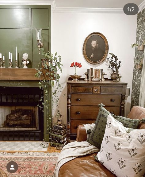 Toile Interior Design, Dark Green Antique Bedroom, Moody Green Living Room Walls, Dark Academia Modern House, Light Moody Decor, Moody Farmhouse Aesthetic, Anthropologie Interior Design, Moody Fireplace Decor, Green Living Room Farmhouse