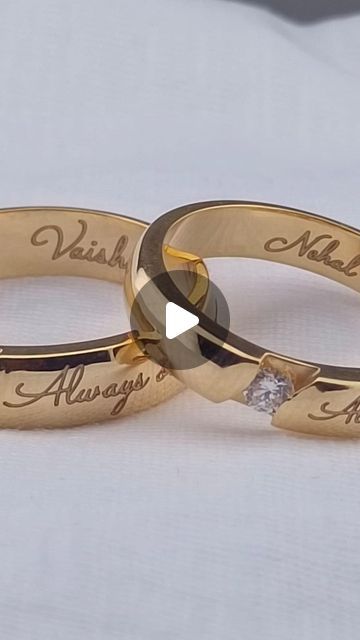 Personalized Wedding Bands (Ships Globally) on Instagram: "💫✨💍Setting couple goals with personalised quote engraved wedding couple rings!!! 💕Be Unique!!! 🫶Be Stylish!!!💍✨💫  #buynow at @www.augrav.com | 9894035834  #CustomGoldRings #EngravedLove #GoldCoupleBands #augrav_nm #augrav_wr #augrav_couple #augrav_love #PersonalizedRings #CoupleGoals #weddingring #wedding  #NameEngravedJewelry #GoldLove #ForeverYours #RingEngraving #CoupleRingGoals #CustomJewelry #GoldEngraving #NameInGold #LoveBands #GoldenCouple #EngravedTogether #EternalLove #HisAndHersRings #GoldBond #SymbolOfLove" Couple Wedding Rings With Names, Couples Ring Set Unique, Couple Bands Rings, Wedding Ring With Name, Wedding Couple Rings, Custom Gold Rings, Personalized Wedding Bands, Couple Bands, His And Hers Rings