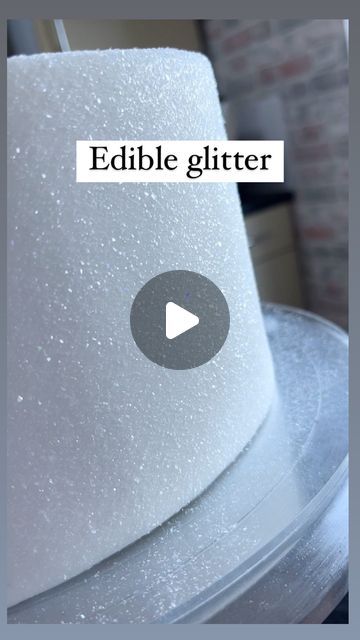 Carol Smith | Cake Artist & Tutor on Instagram: "Edible glitter   ✨ Don’t they look so pretty!  Hands down, this is the most popular glitter/sparkly effect that is requested with my wedding cakes.   Super easy to use and can transform your cakes into looking like sheer beauties.   These are called ‘Twinkles’ which are by @magic_sparkles_global and come in a range of colours.   Available in most sugarcraft suppliers and you can also purchase them on Amazon.   To cover a 10” cake I used approx 2 1/2 of the tiny tubs (it goes a long way!)   #caketips #sugarcraftteacher #cakesbycarol #cakedecorating #cakedecorator #glitter" Bling Cakes Birthday, Diamond Cake Ideas, Glitter Cake Birthday Sparkle, 2024 Wedding Cake, Smith Cake, 1 Tier Wedding Cakes, Sparkly Wedding Cakes, Glamour Cake, 60 Wedding Anniversary Cake