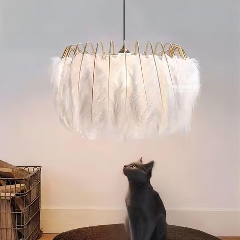 Product Description Plunksnomis Chandelier, charming feather lamps come with luxurious black or white feathers, secured by a gold metal wire frame. ‎Soft and sophisticated, these lights are reminiscent of the elegant feather boas and lavish hats of the past, but the design is completely modern. ‎These lamps feature a circle of real feathers secured by a series of gold metal arms, which emit an alluring glow and flicker when lit. ‎ Use scenario: All Collections, All Rooms, Bedroom, Living Room, Dining Room, Foyer, Restaurant, Hotel, Office Lighting, Hot Selling, New Collection Please note: Your payment does not include customs duties, local taxes or any other import fees. If you have any questions about our products, please contact us and we will respond to you within 24 hours. Product Size