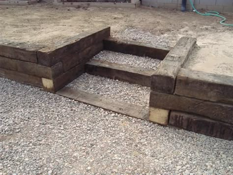 Rail road tie steps Railroad Ties Landscaping, Wooden Retaining Wall, Railroad Tie Retaining Wall, Retaining Wall Steps, Wood Retaining Wall, Railroad Tie, Backyard Retaining Walls, Retaining Wall Ideas, Building A Retaining Wall