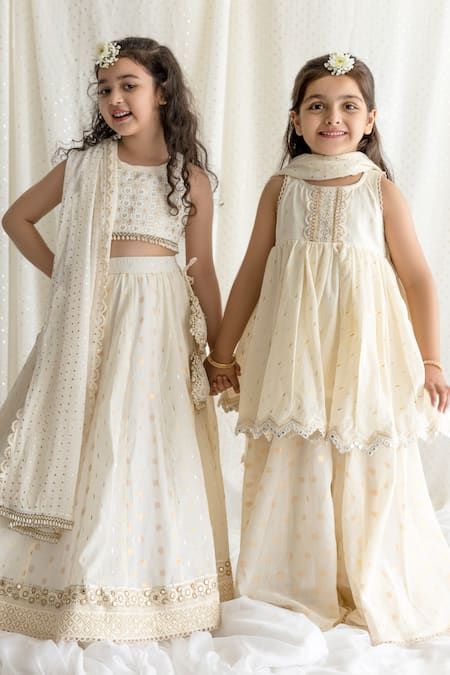 Buy Ivory Cotton Lining Mulmul Embroidered Thread Work And Sequin Lehenga Set For Girls by Chotibuti Online at Aza Fashions. Indian Dresses For Kids, Sequin Lehenga, Hand Embroidered Dress, Kids Christmas Dress, Ethnic Wear Indian, Kids Ethnic Wear, Diwali Outfits, Wedding Dresses For Kids, Lehenga Designs Simple