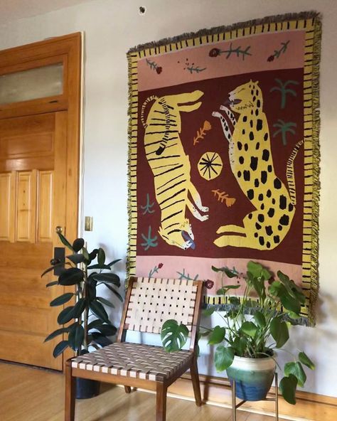 Slowdown Studio on Instagram: “The big cats hanging on the wall of the beautiful home of @plot.twist.interiors. Blanket design by @jamesdaw_illustration. 🌱” Slowdown Studio, Leopard Print Rug, Tiger Blanket, Couches Living, There Are No Rules, Tassel Blankets, Wild Leopard, Blanket Design, Grey Couches