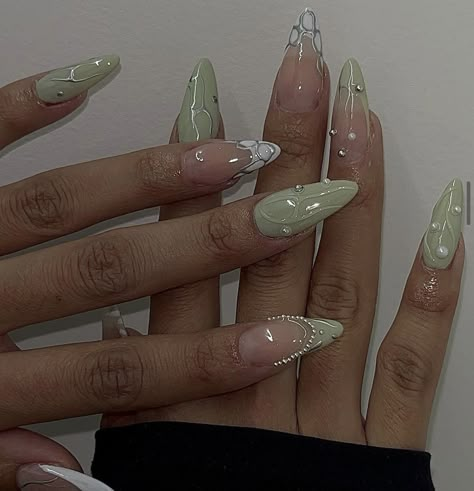 Sage Green Almond Shaped Nails, Sage Green Stiletto Nails, Almond Acrylic Nails Green, Sage Almond Nails, Almond Nails Sage Green, Sage Green Nails Almond, Pastel Green Nails Design, Sage Green And White Nails, Pastel Green Nail Art