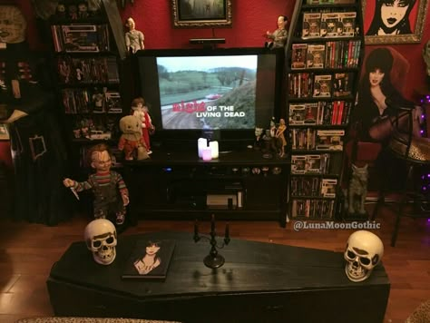 Our home is filled with horror themed room decor & collectables. Our home is 1500 square feet, so we use every inch to our advantage. This is our living room area with a coffin table and coffin dvd cases my husband built. Horror Theme Living Room, Horror Movie Living Room, Horror Themed House, Horror Living Room Ideas, Horror Themed Room Aesthetic, Horror Inspired Room, Horror Movie Themed Bedroom, Horror Collection Room, Horror Movie Themed Room