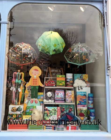 Kids Rainy day window February 2019 Toy Store Window Display Ideas, Toy Window Display, Book Store Window Display, Umbrella Window Display, Bookstore Window Displays, Toy Store Window Display, Retail Window Display Ideas, Rainy Day Window, Back To School Window Display