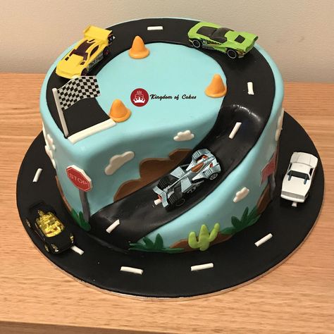 🚗🎂 Rev up your engines for this stunning car-themed road cake! With its realistic road details and adorable car toppers, it's the perfect centerpiece for any car enthusiast's celebration. 🌟🚙 Designed to delight both kids and adults, this cake is not just a treat for the taste buds but a visual feast too. 🍰🏁 Buckle up and join us for a slice of fun on this delicious journey. 🚧🎉  Delivery across Delhi NCR Visit website www.kingdomofcakes.in for more unique designs or call 9999812200 Car Cake Designs For Kids, Car Cakes For Boys, Digger Cake, Car Cakes, Cake Recipes For Kids, Cars Birthday Cake, Cars Cake, Cake Kids, Truck Cakes