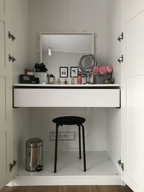 I never liked doing my makeup/ hair in the bathroom, so I decided to go for a table with a mirror in my bedroom. Ikea pax wardrobe was perfect for it, because it’s cheap and aesthetically pleasing. Instead of purchasing a table to put inside of the wardrobe I chose just to put a shelf and a drawer ( that made the table). Used the drawer to put hairdryer, straightener etc. anything with a cable, as I hate the routine of unplugging them and putting them away. Pax Makeup Vanity, Make Up Table In Wardrobe, Vanity In Pax Closet, Wardrobe With Dressing Table Inside, Makeup Table Inside Wardrobe, Pax Wardrobe Dressing Table, Pax Wardrobe Drawers, Pax With Dressing Table, Vanity Inside Wardrobe