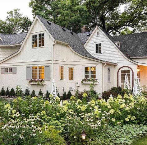 creamy white exterior, exterior house, exterior ideas, white siding, tudor home, home plans, exterior Coastal Cottage Garden, Cottage Exterior, White Cottage, Traditional Landscape, Style Cottage, Front Yard Landscaping Design, Exterior Home, House Exteriors, Landscaping Design