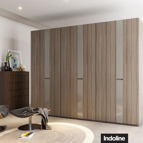 The combination of dual textures of Glossy lacquer and PVC Membrane give this wardrobe its chic look. #furniture #lifestyle #customisedfurniture #furnituredesign #homefurniture #interiordecor #interiordesign #interiorstyling #interiorinspiration #furnitureinspiration #homedecor #Indoline Sliding Door Wardrobe Designs, Wardrobe Design Modern, Door Options, Hidden Doors, Wardrobe Interior, Wardrobe Door Designs, Wardrobe Designs, Wardrobe Interior Design, Wardrobe Door