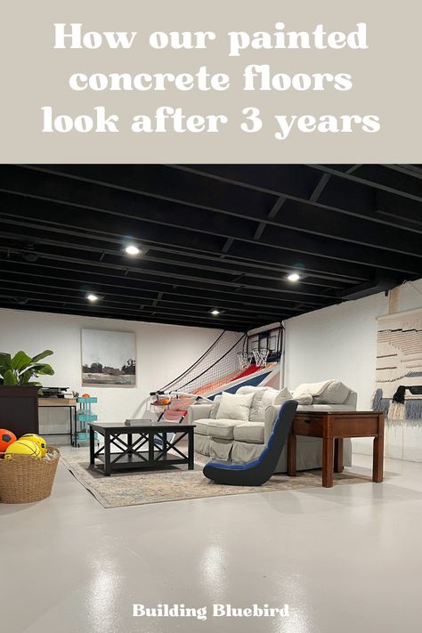 Painted Concrete Floors Update - 3 Years Later Concrete Floor Paint Colors, Painted Cement Floors, White Concrete Floors, Interior Concrete Floors, Painting Basement Floors, Concrete Basement Floors, Rustic Basement Bar, Basement Floors, Floor Paint Colors