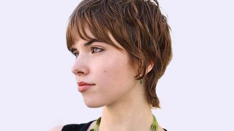 30 Flattering Hairstyles for Women Over 60 with Glasses Brunette Pixie Cut With Highlights, Brunette Pixie With Highlights, Pixie Shag, Short Brunette, Layered Pixie Cut, Wolf Hair, Short Brunette Hair, Pixie Mullet, Brunette Pixie