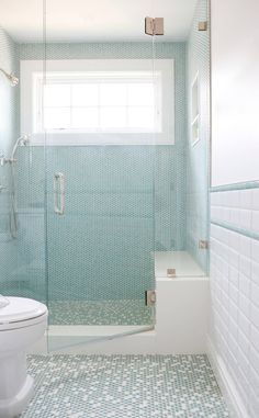 bathroom with walk-in shower and turquoise penny tile Penny Tile Bathroom, Blue Penny Tile, Penny Tiles Bathroom, Penny Tiles, Beautiful Bathroom Designs, Tiles Ideas, Penny Tile, Bathroom Redesign, Bathroom Remodel Shower