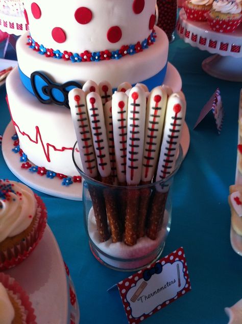 nursing graduation party ideas | Nurse Hello Kitty themed graduation party. Thermometer chocolate ... Medical Themed Treats, Nursing Graduation Party Snacks, Nurse Hello Kitty, Nursing Graduation Party Ideas, Graduation Party Snacks, Covered Pretzel Sticks, Pretzel Ideas, Hello Kitty Graduation, Medical Themed Parties