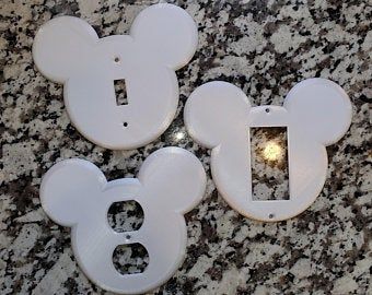 Outlet cover | Etsy Disney Bedding Subtle, Adult Disney Guest Rooms, Disney Light Fixtures, Storage Room Disney Dream Light Valley, Mickey Mouse Bathroom Pottery Barn Kids, Mickey Mouse Wall Mirror, Disney Backsplash, Disney Bedroom For Adults, Disney Key Hooks