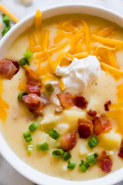 Creamy Potato Soup. This simple potato soup is ultra creamy and comforting! With only a few ingredients this soup comes together quickly on the stovetop. Load it up with all your favorite toppings for the ultimate in comfort food! Simple Potato Soup, Best Potato Soup, Cheesy Potato Soup, Potato Soup Easy, Loaded Potato Soup, Creamy Potato Soup, Baked Potato Soup, Comfort Food Recipes Dinners, Delicious Soup Recipes