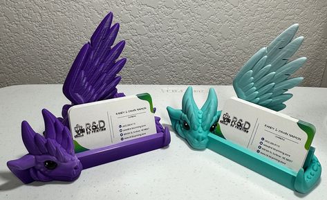 Display your business cards with the power of dragons, with these fiery 3D printed holders! Forged with innovative technology and sure to heat up any networking situation, these Dragon Business Card Holders will be sure to make a lasting impression. Bring the heat! 3d Printed Card Holder, Unique Business Card Holder, Cool Things To 3d Print, 3 D Printer Projects, 3d Printing Ideas To Sell, Cute 3d Printing Ideas, 3d Printing Ideas Useful, 3d Printed Stuff, 3d Printed Gifts