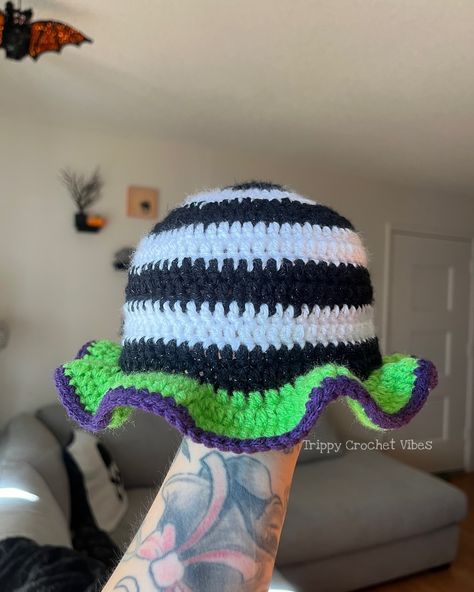 Good Morning Friends ☀️ . . Peep out this cute Beetlejuice inspired Bucket hat that I made for my son ☺️ . 🥹 He looks so adorable in it. I’m So happy with the way it came out 🤌🏼 . Can’t wait to take some photos with all of us in our Beetle Juice inspired Bucket hats 💚🖤💚 . Pattern is by: Me ☺️✨ . . Who’s all ready for the new Beetlejuice movie? 🍿 I am super pumped to see it! 🤩 . #crochet #crochetaddict #crochetbuckethat #crochettoddlerbuckethat #toddlerhat #crochetersofinstagram #crochetpatte... Crochet Beetlejuice Sandworm, Crochet Halloween Bucket, Beetle Juice Crochet, Trippy Crochet, Crochet Beetlejuice, Beetlejuice Crochet, Crochet Vibes, Geek Crochet, Beatle Juice