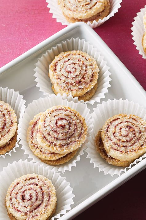 Adorable and sweet, it’s no surprise these Raspberry Almond Pinwheel cookies taste as good as they look. Add a batch to your Christmas cookie spread and watch them disappear! Raspberry Pinwheel Cookies, Christmas Pinwheel Cookies, Pinwheel Cookies Recipe, Pinwheels Recipe, Pinwheel Cookies, Raspberry Cookies, Pinwheel Recipes, Raspberry Almond, Cookies Baking